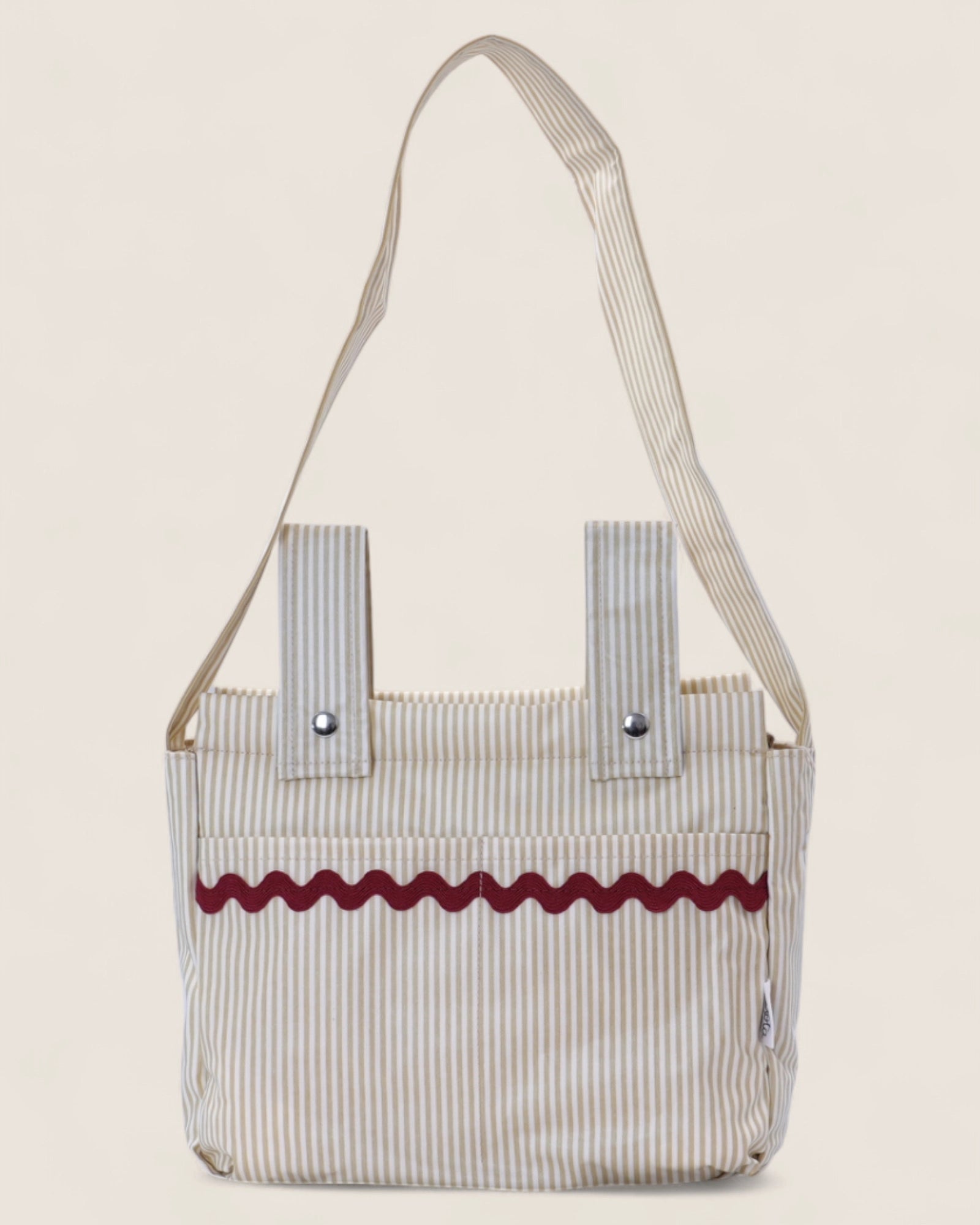 Striped baby stroller bag with a red decorative waved strip