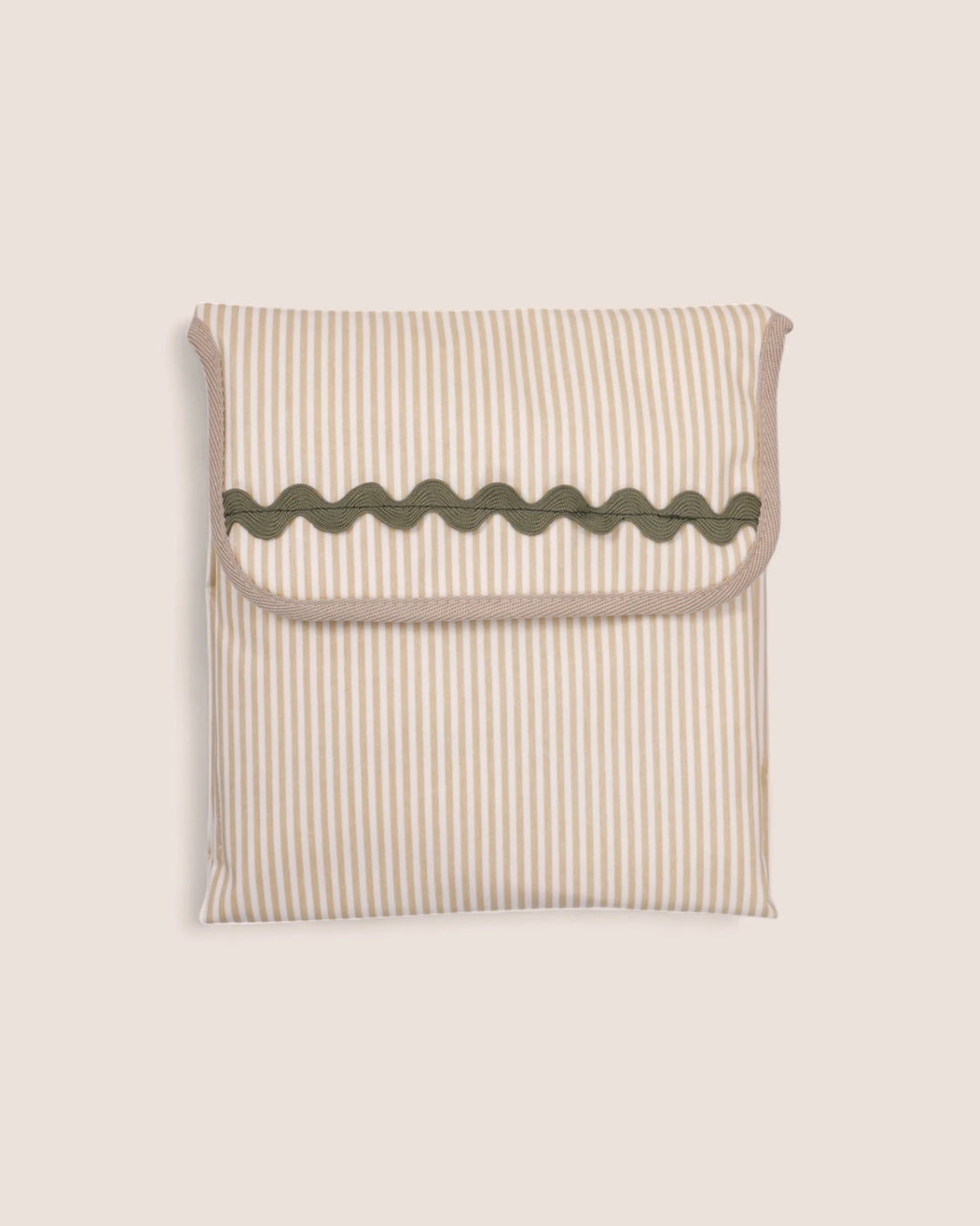 folded baby changing mat striped beige with green waved detail