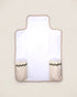 baby changing pad with beige border and green trim