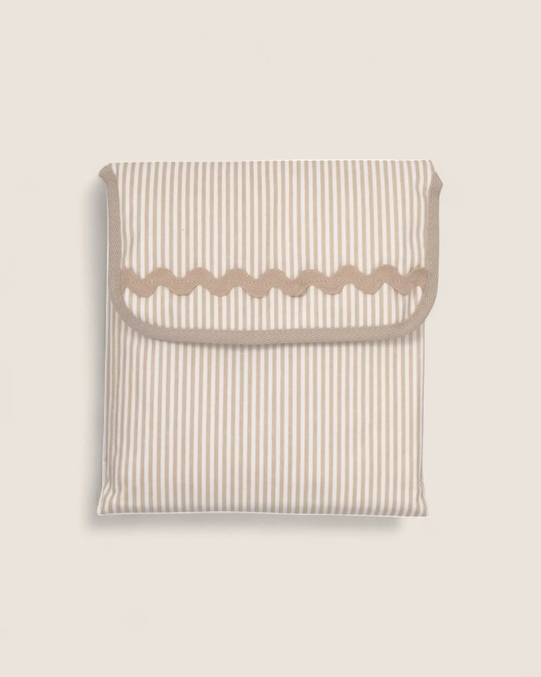 baby changing mat folded, beige stripes and beige waved detail