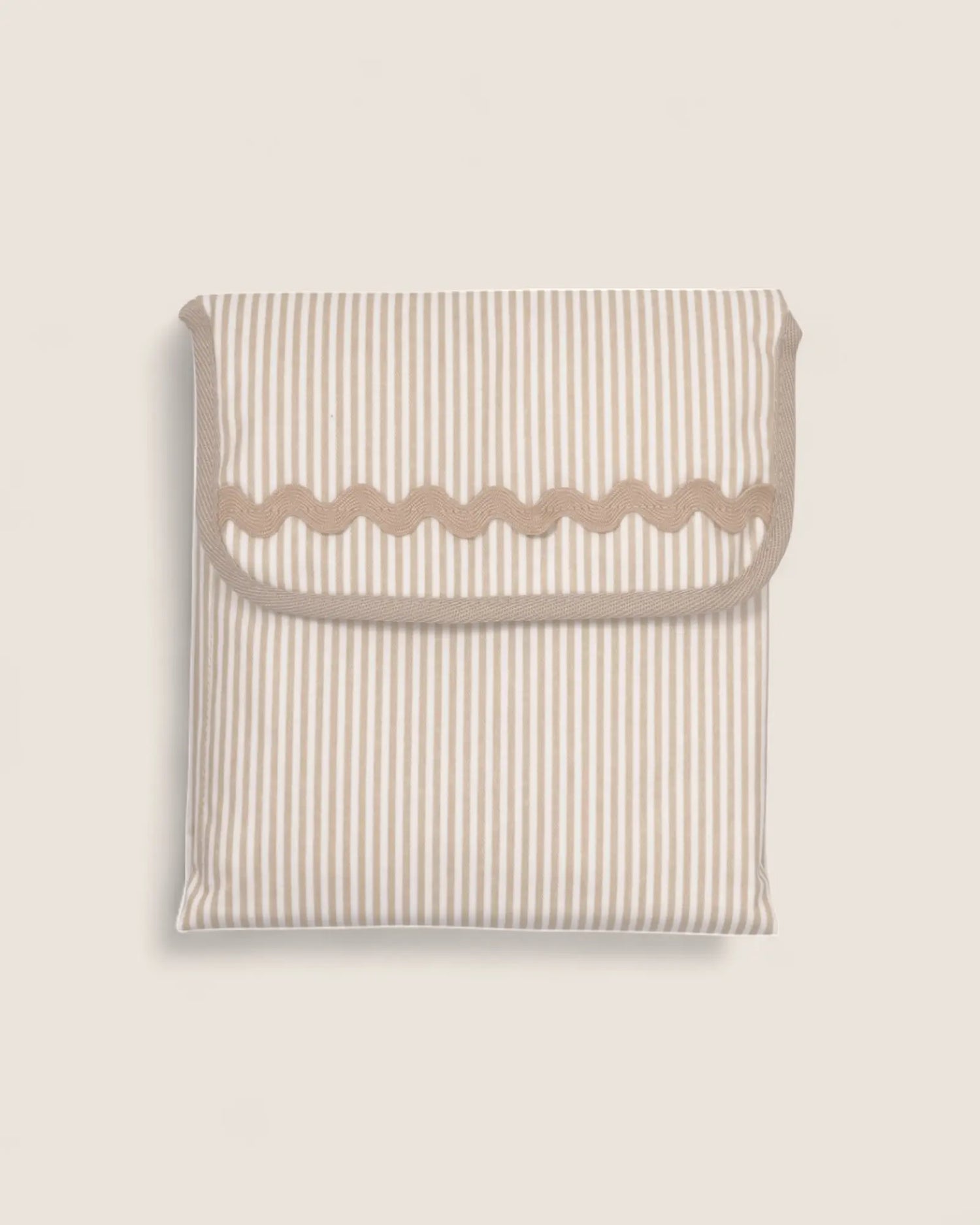 baby changing mat folded, beige stripes and beige waved detail