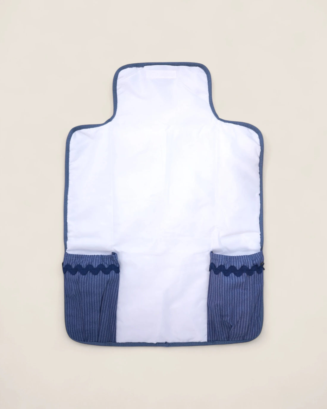 baby changing mat with blue pockets for diapers and wipes 