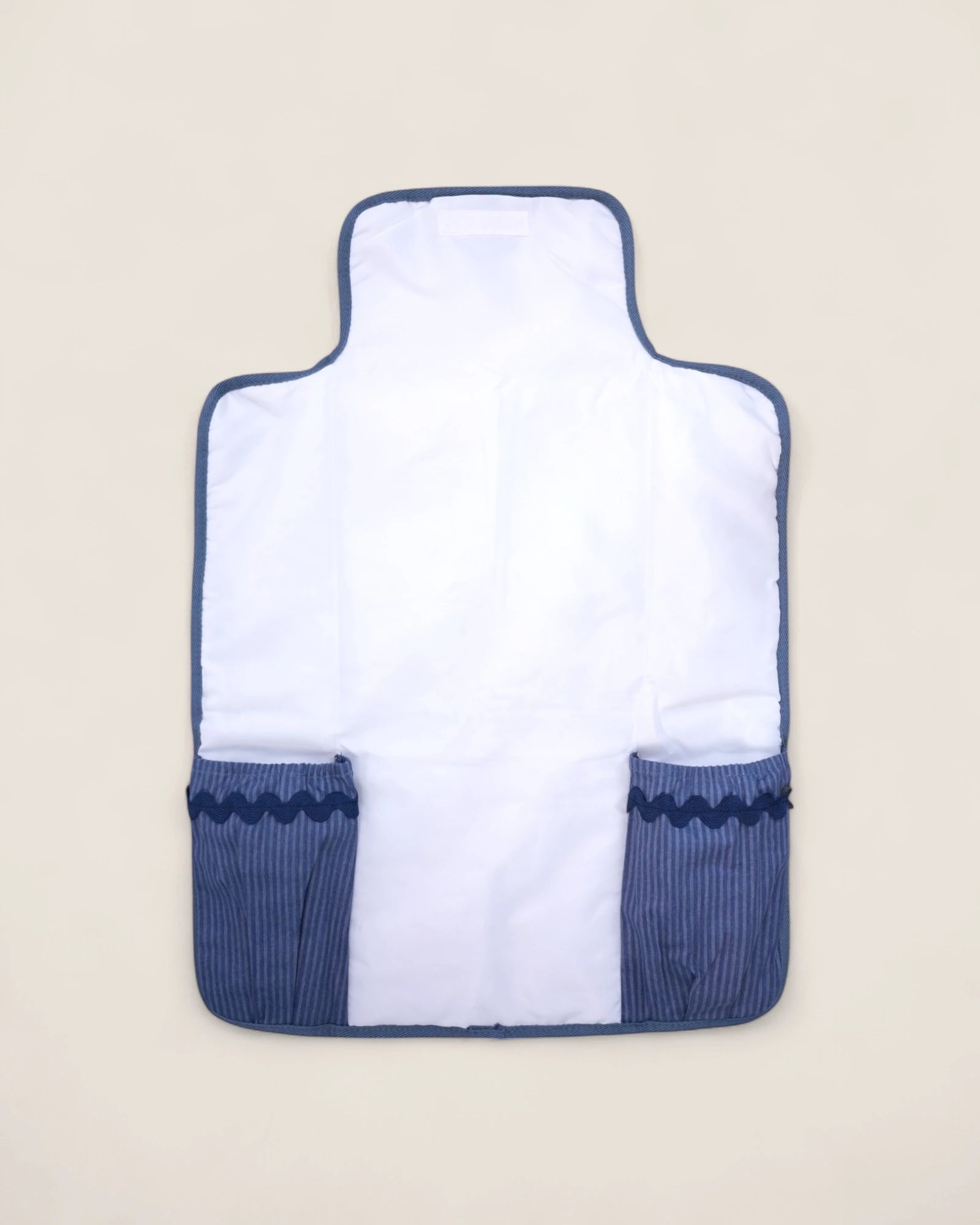 baby changing mat with blue pockets for diapers and wipes 