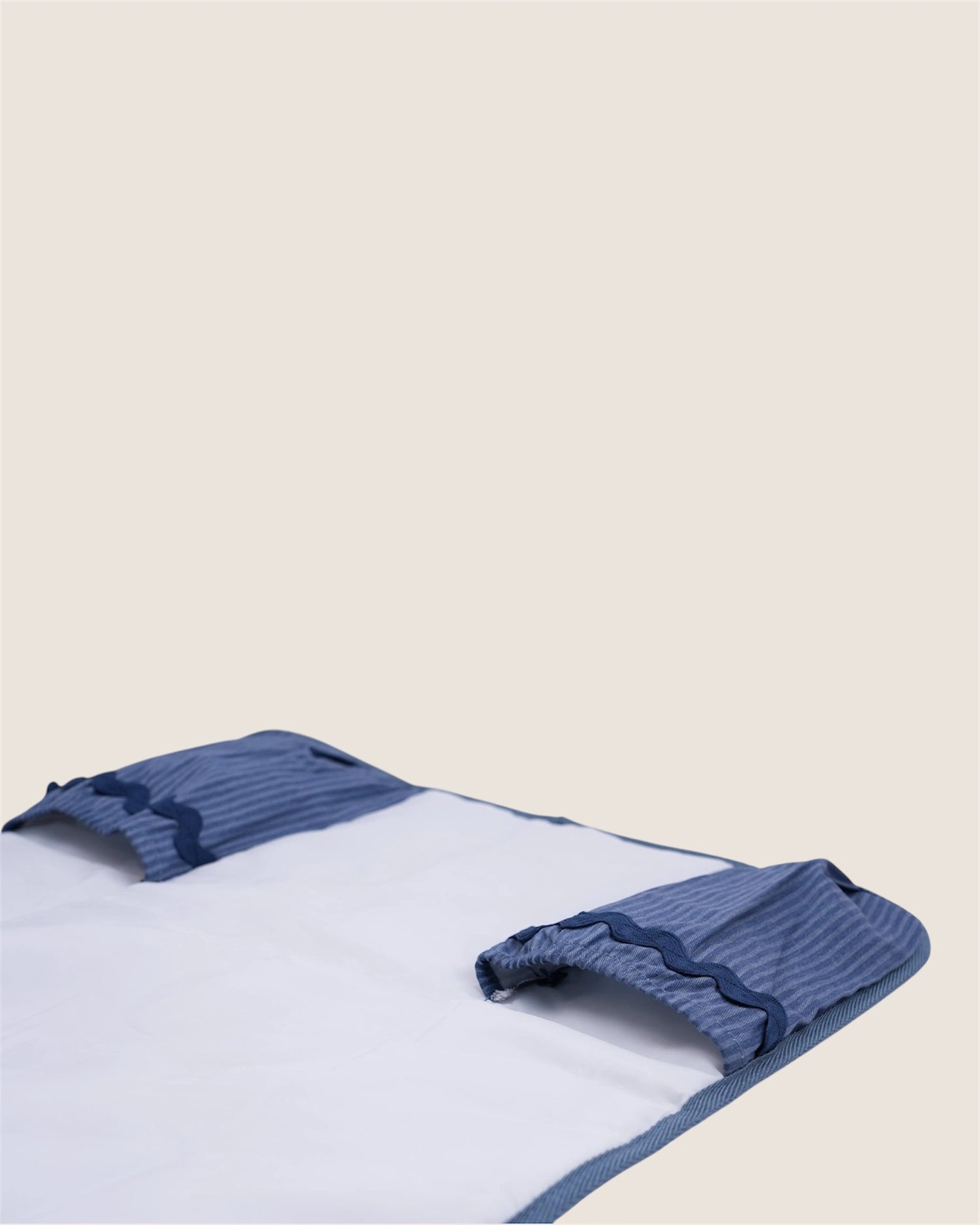 baby changing mat with blue pockets for diapers and wipes 