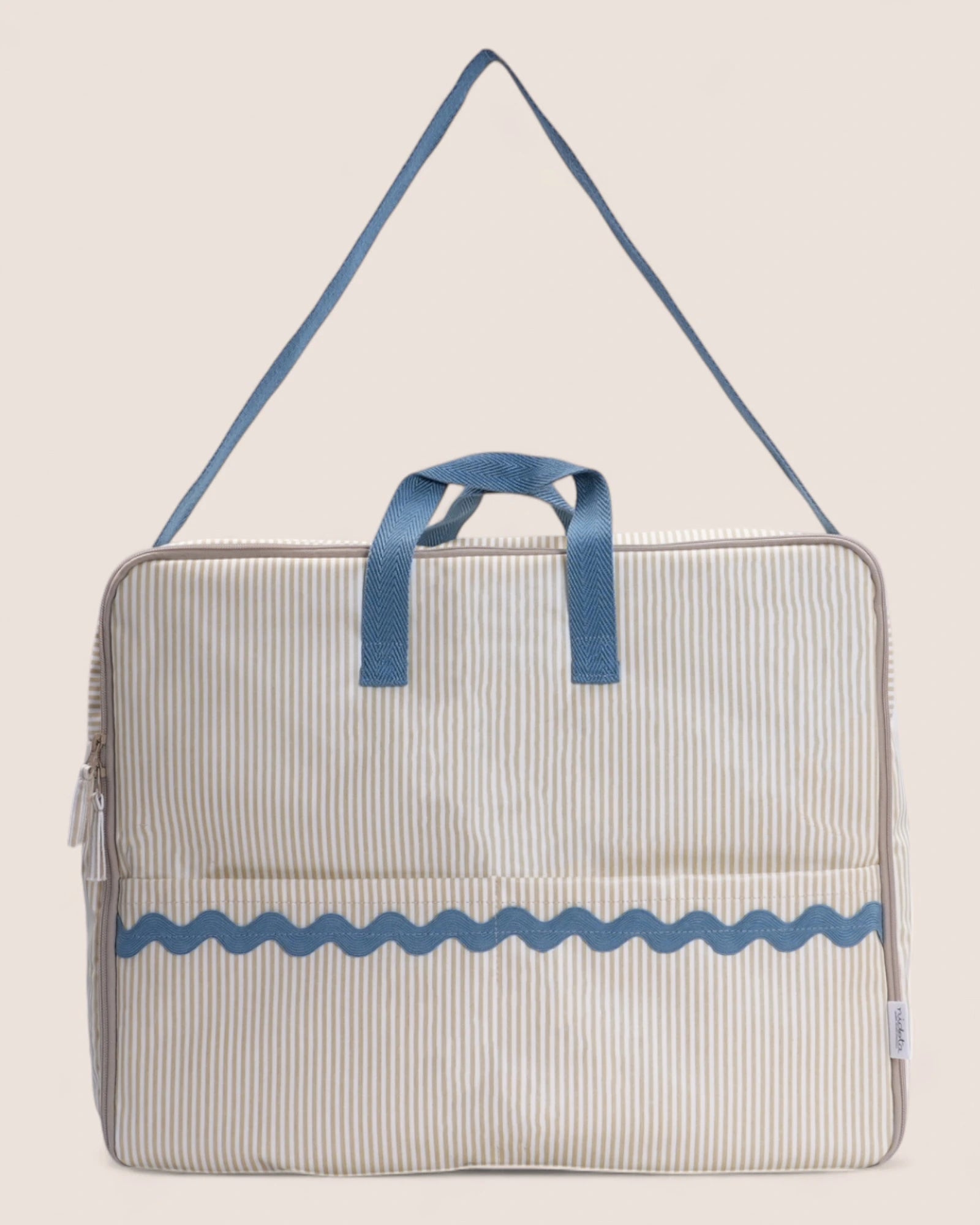 striped beige maternity bag with blue handles and details