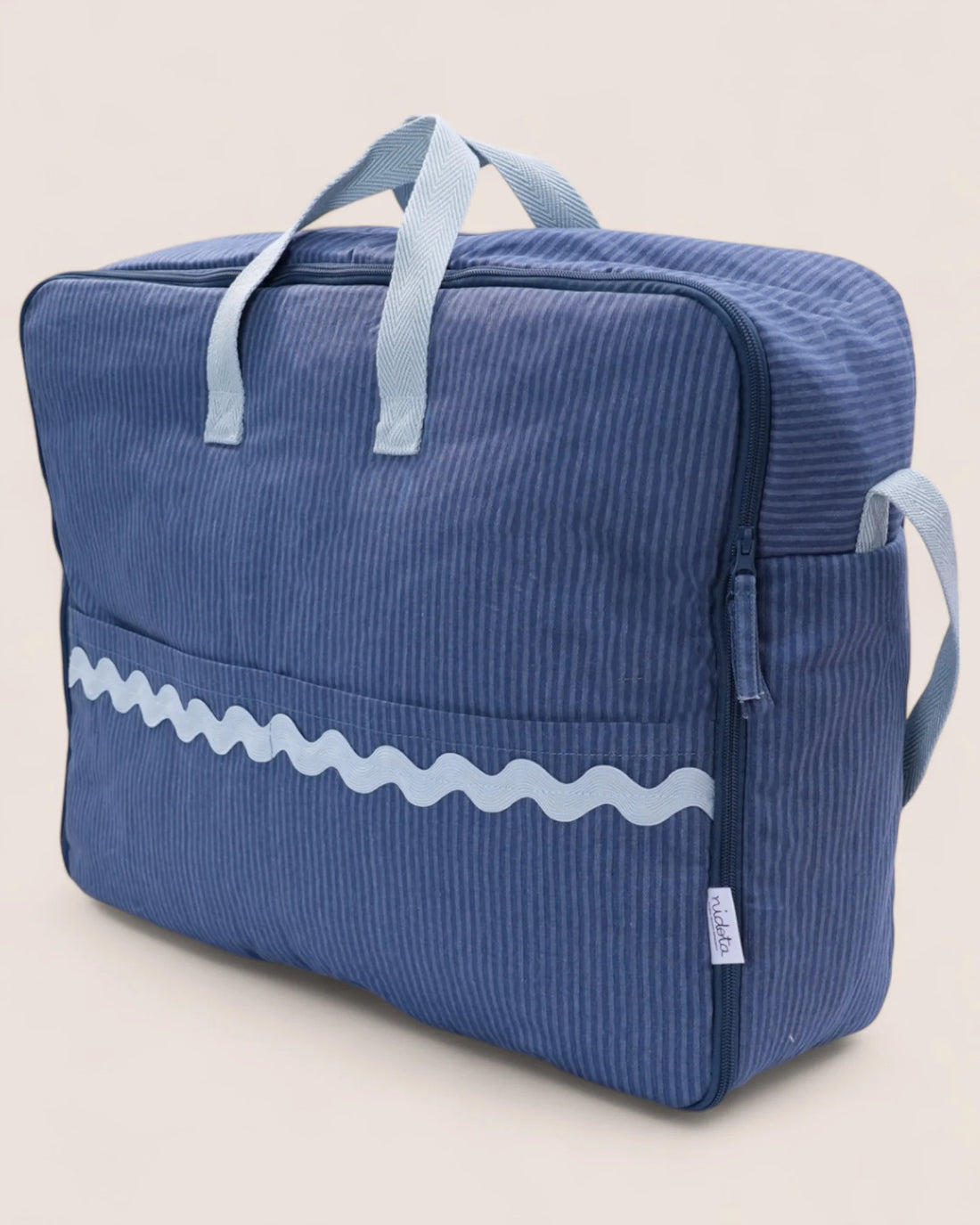 Blue striped maternity suitcase bag with light blue waved details and handles