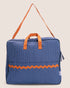 Blue striped maternity suitcase bag with orange waved detail and handles on a beige background