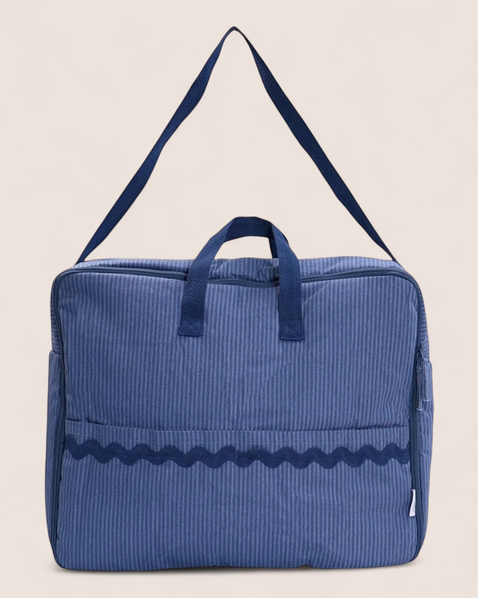 striped blue maternity suitcase bag with marine handles and waved design