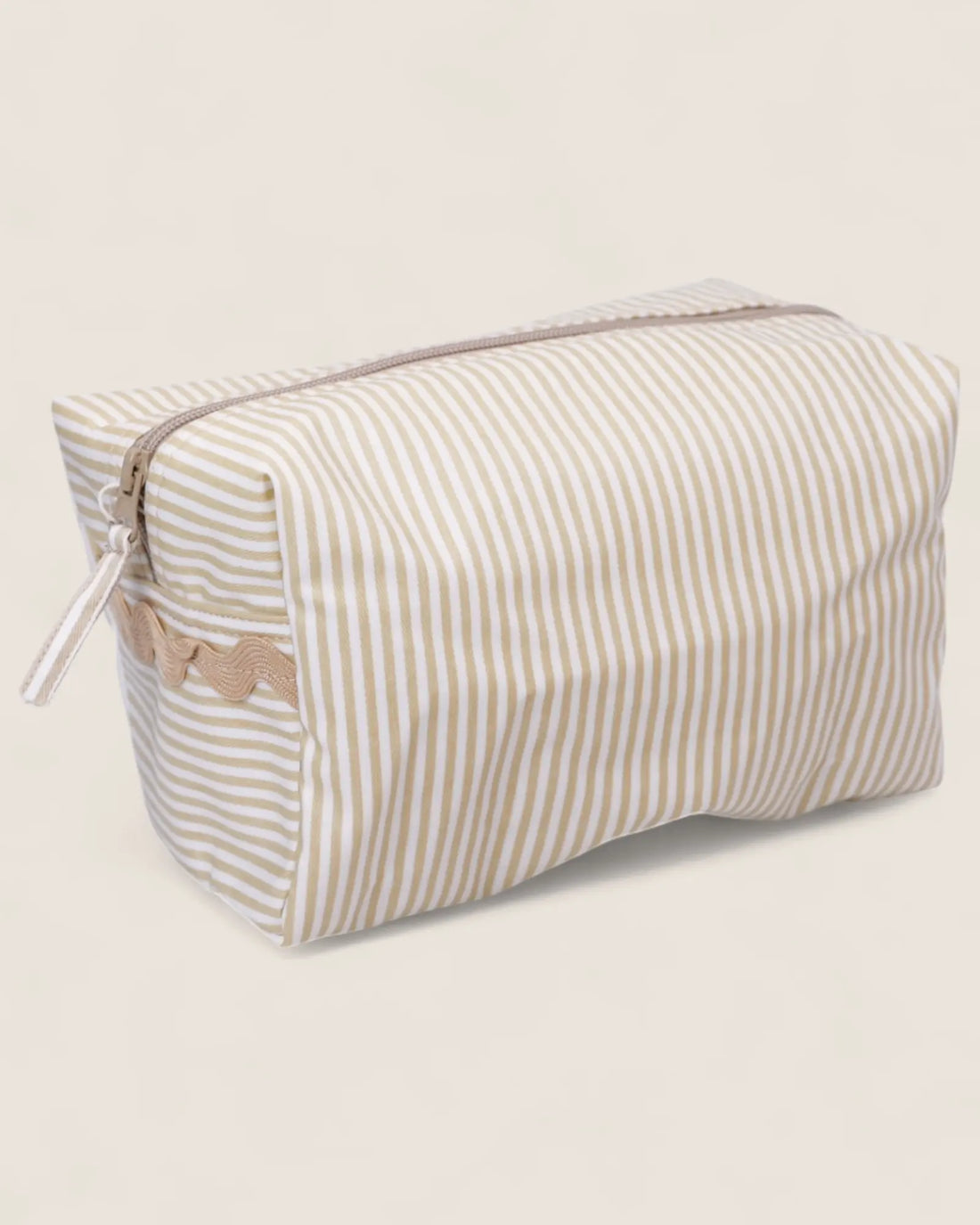 Striped toiletry bag with a beige zipper 