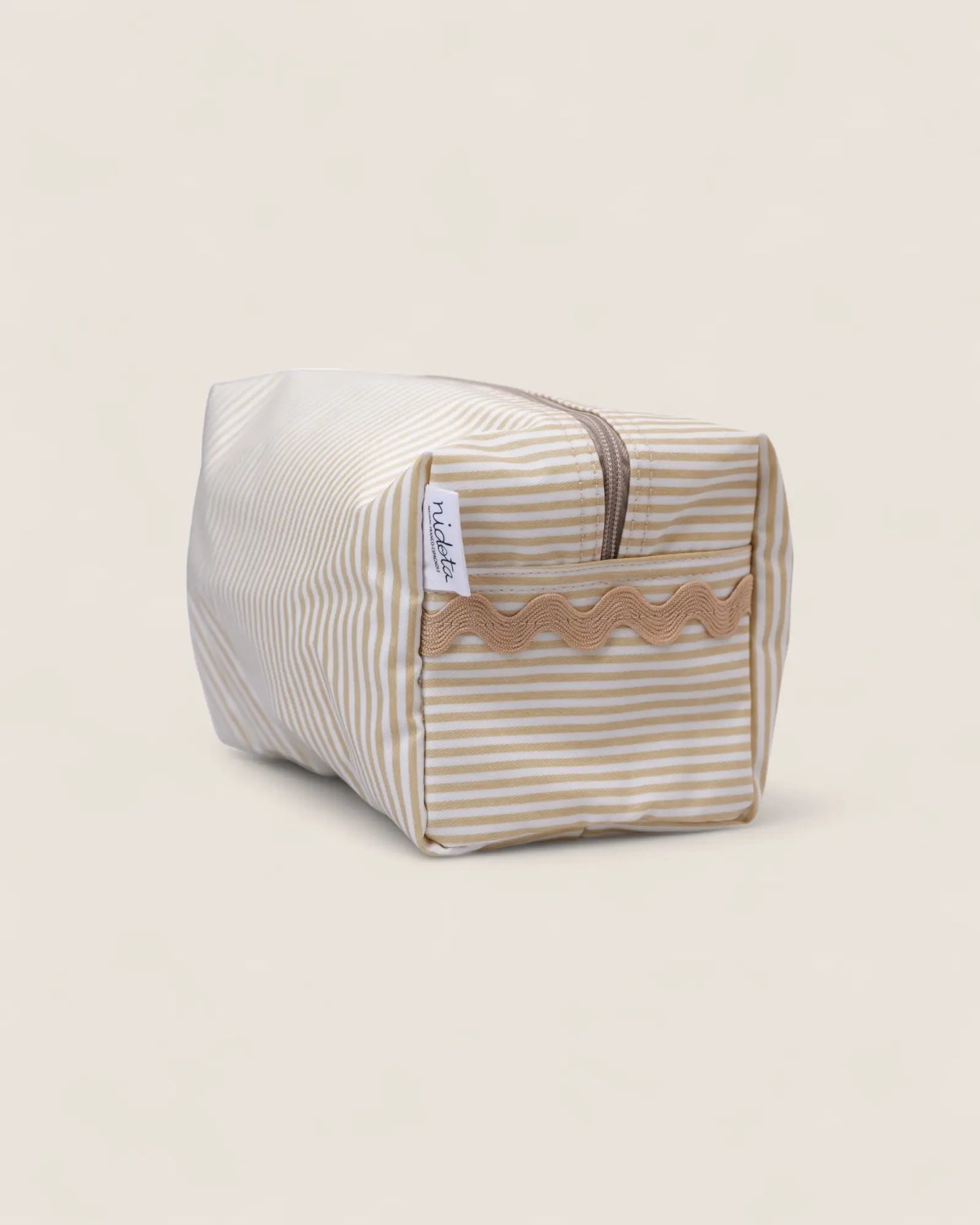 Striped toiletry bag with waved beige detail