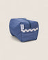Blue striped toiletry bag with white waved detail and blue zipper