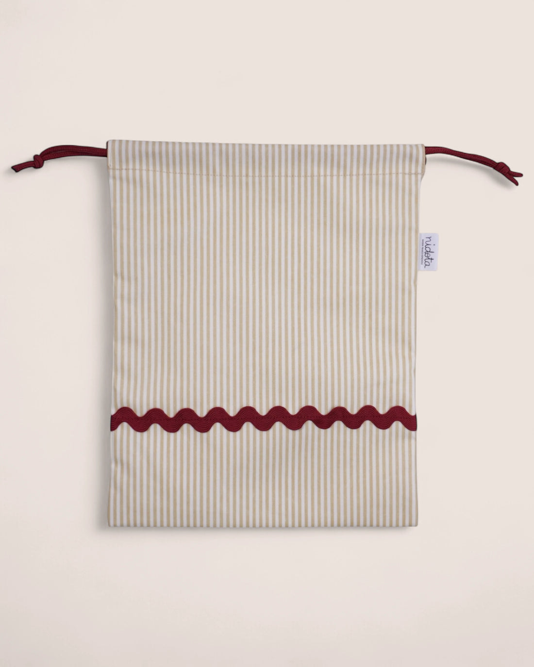 pouch bag with striped beige pattern and red waved details
