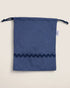 striped blue pouch bag with wavy navy design 